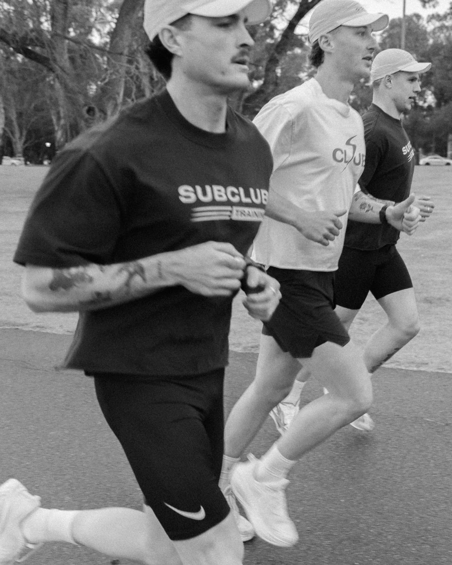 Tight frame of the Subclub pack running in formation