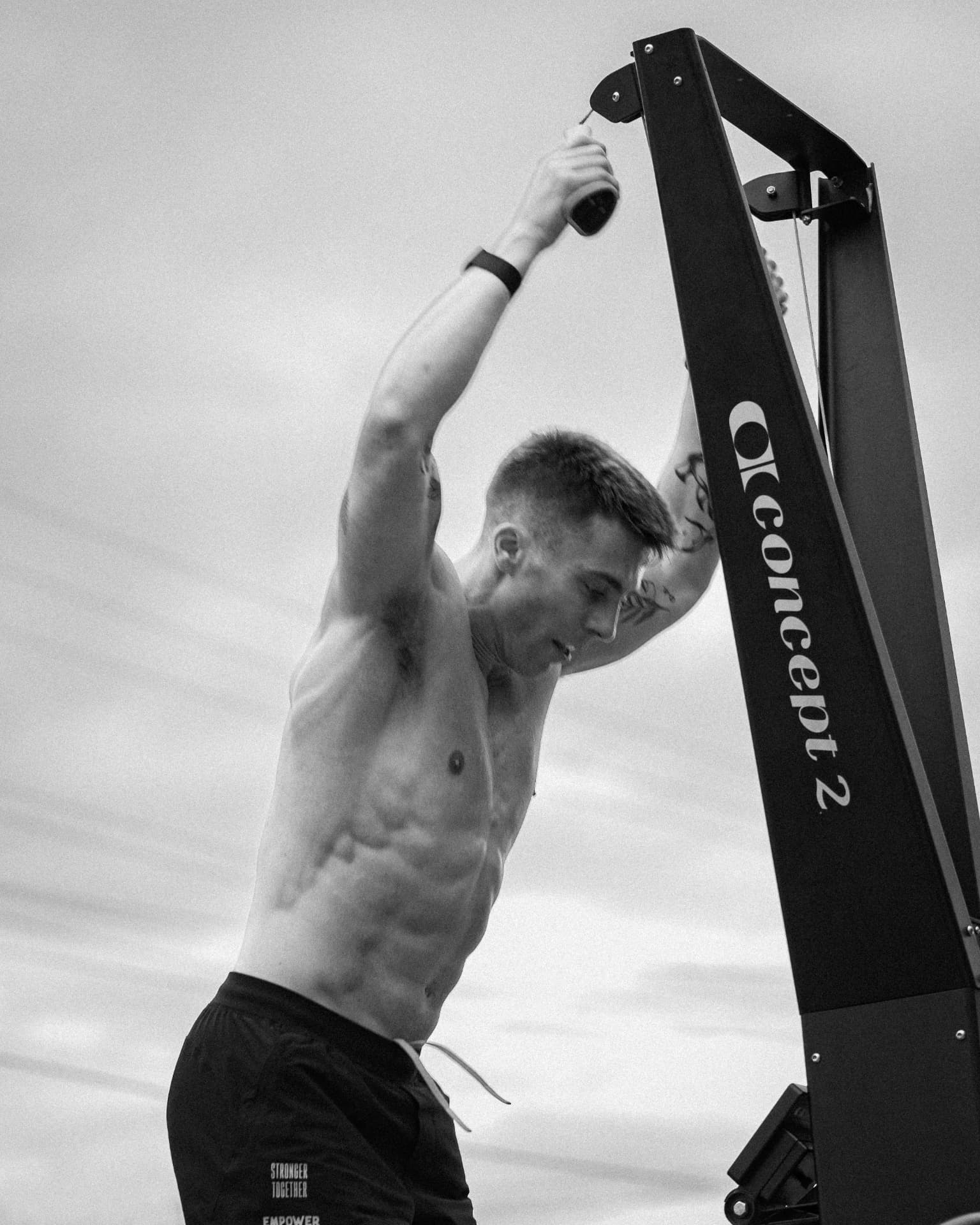 Athlete finishing a set on a Concept 2 ski erg