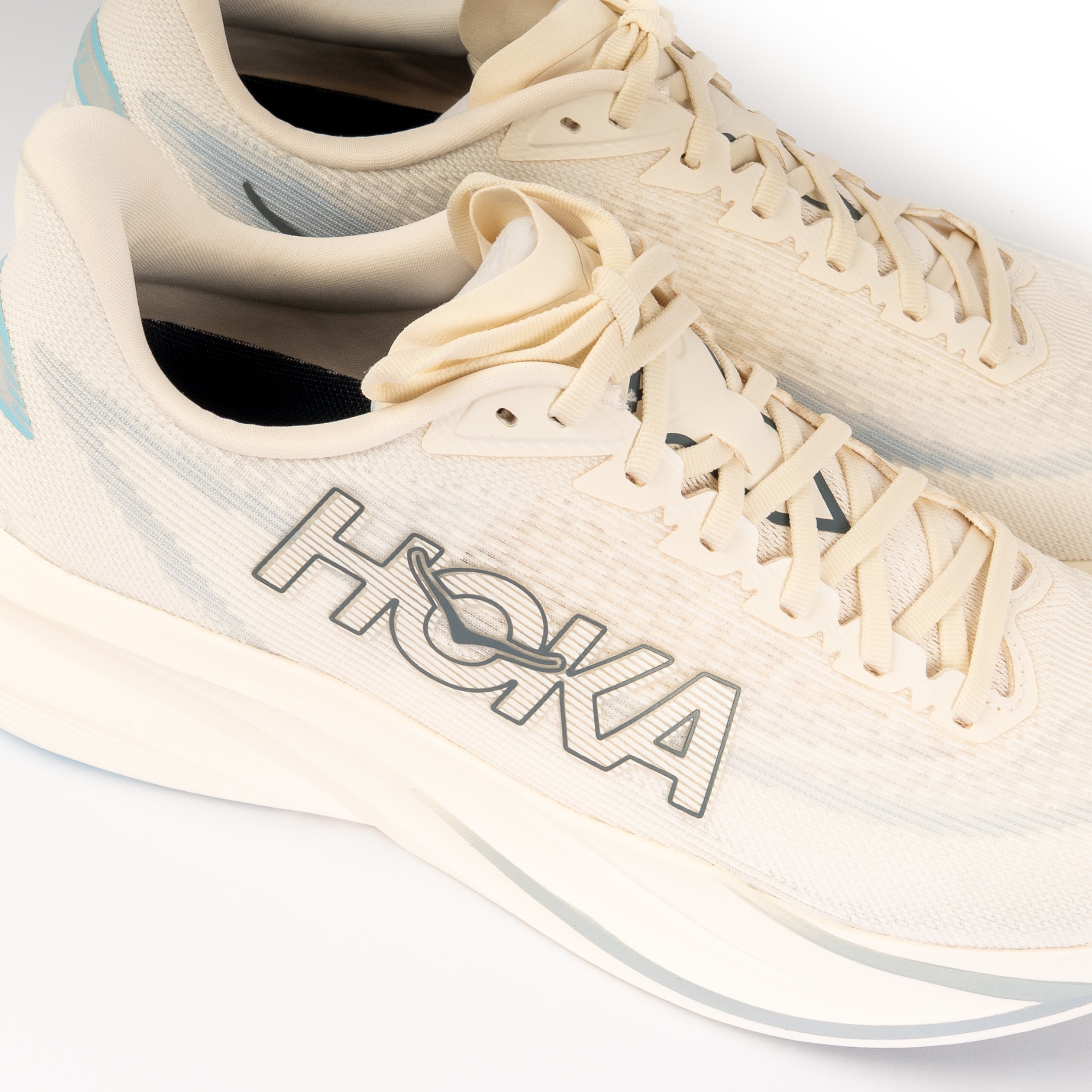Close-up of HOKA laces and outline logo on the side panel